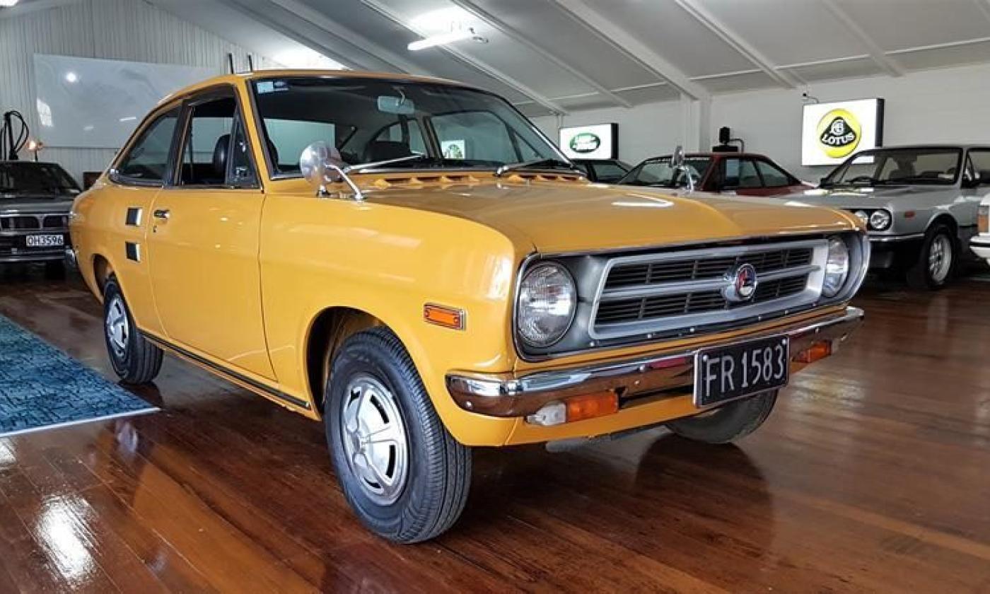 Orange 1971 Datsun 1200 coupe original restored images (3).jpg