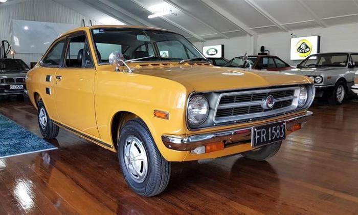 Orange 1971 Datsun 1200 coupe original restored images (3).jpg