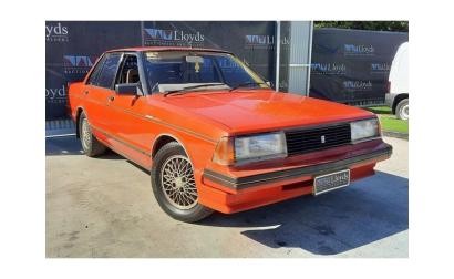 Nissan P910 TR-X TRX 1984 sedan red images  (1).jpg