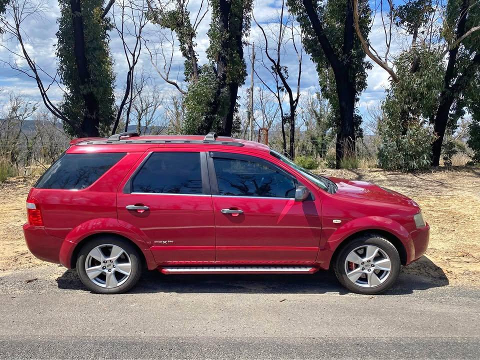 Red maroon Ford Territory F6X FPV 2008 (1).jpg